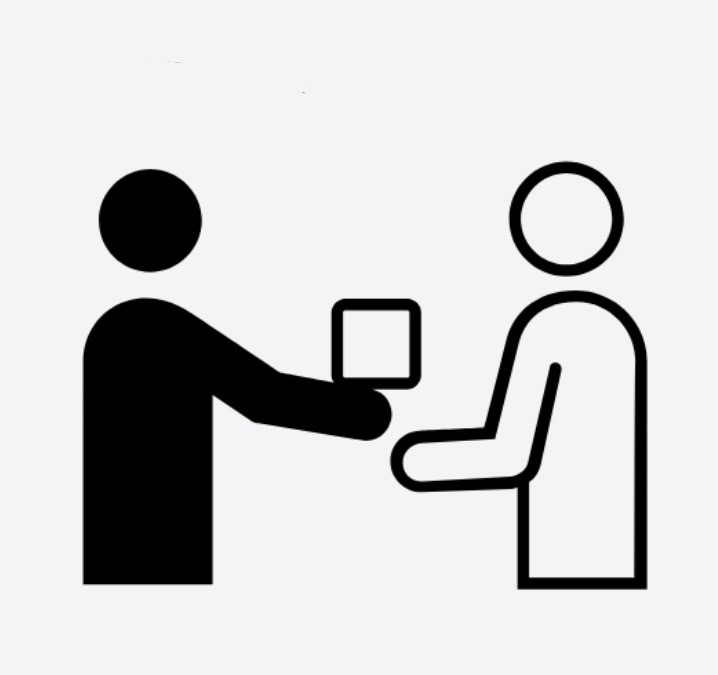 Black-and-white icon of one person handing a book to another, symbolizing Bible delivery.

